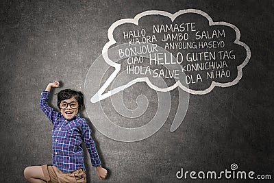 Happy little boy learning multilingual Stock Photo