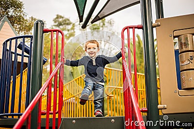 Happy little boy on the playground Stock Photo