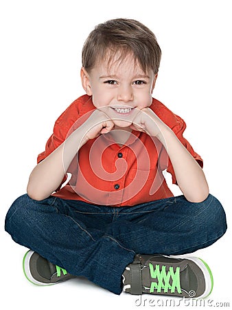 Happy little boy in the red shirt Stock Photo