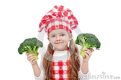 Happy little chef girl with broccoli Stock Photo