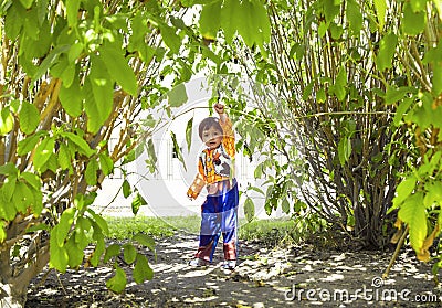 Happy little child playing superhero Stock Photo