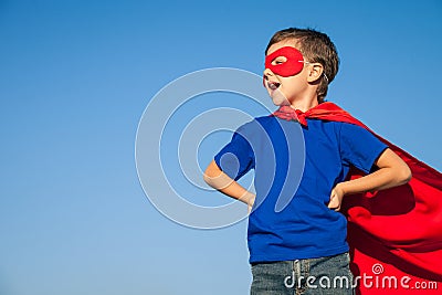 Happy little child playing superhero. Stock Photo