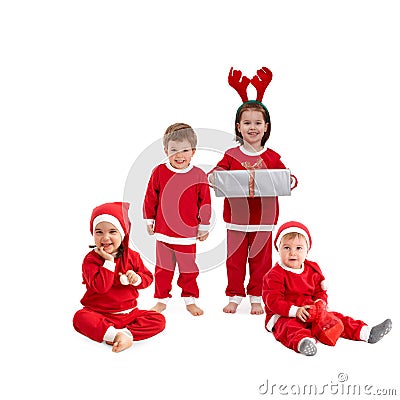 Happy little children in Santa costume Stock Photo