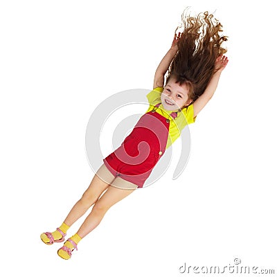 Happy little girl falls down Stock Photo