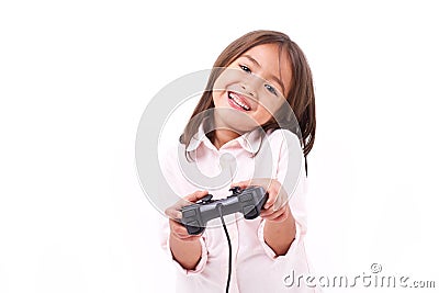 Happy little girl gamer playing video game Stock Photo