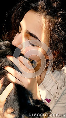 Little girl with black bunny Stock Photo