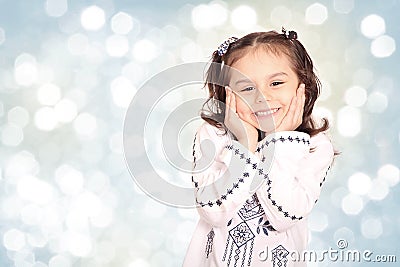 Happy little girl with her sheep toy - celebrating Eid ul Adha - Stock Photo