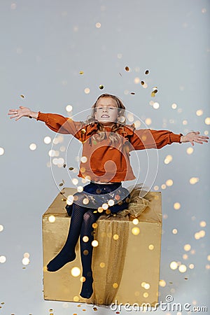 A happy little girl makes a wish Stock Photo