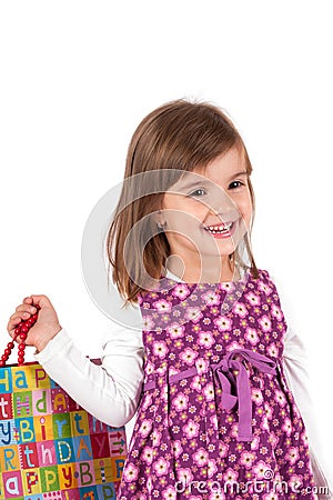 Happy little teenage girl with gift box Stock Photo