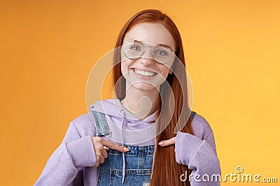 Happy lively friendly redhead european girl pointing herself suggesting help boasting telling own accomplishments Stock Photo