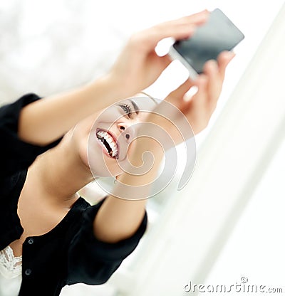 Happy lively woman taking her selfie Stock Photo