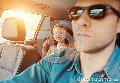 Happy long journey in car with father Stock Photo