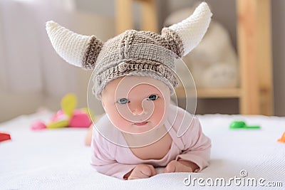 Happy-looking baby posing for camera Stock Photo