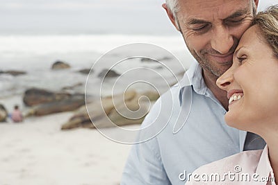 Happy Loving Couple At Beach Stock Photo