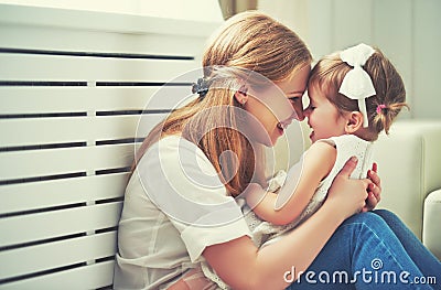 Happy loving family. mother and child playing, kissing and hugg Stock Photo