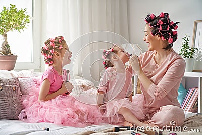 Mom and children doing makeup Stock Photo