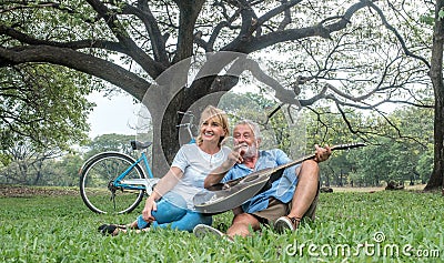 Happy loving senior couple spending the day in the countryside and having fun. concept about seniority and people Stock Photo
