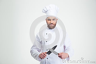 Happy male chef cook sharpening knife Stock Photo