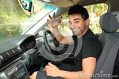 Happy male driver holding car keys Stock Photo