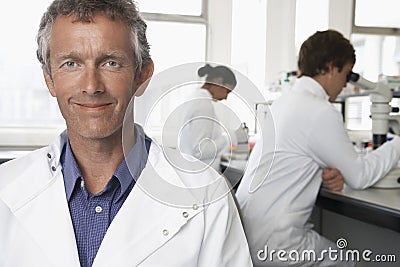Happy Male Scientist In Laboratory Stock Photo