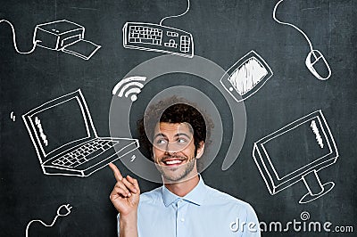 Happy man with computer technology Stock Photo