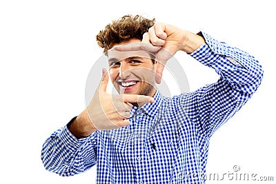 Happy man framing photograph Stock Photo