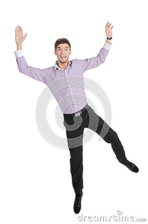 Happy man. Happy young men jumping with his hands up against white Stock Photo