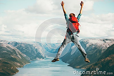 Happy Man jumping Travel Lifestyle adventure concept Stock Photo