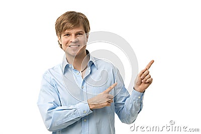 Happy man pointing to blank space Stock Photo