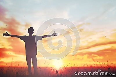 Happy man rise hand on morning view. Christian inspire praise God on good friday background. Male self confidence empowerment on Stock Photo