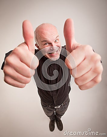 Happy man and thumbs up in wideangle Stock Photo