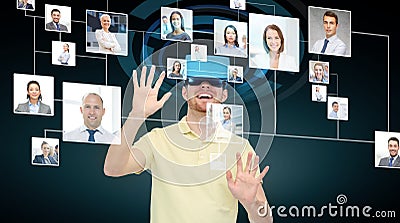 Happy man in virtual reality headset or 3d glasses Stock Photo