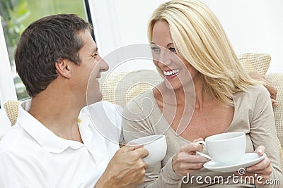 happy man woman couple drinking tea coffee 22862334