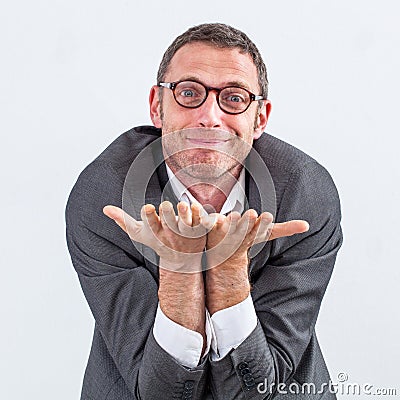 Happy manager begging or offering something for kindness or generosity Stock Photo