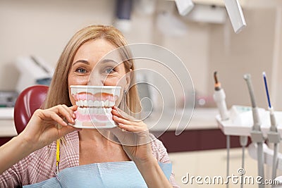 Cheerful woman having dental checkup Stock Photo