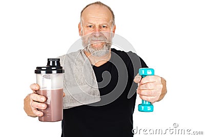 Mature man with protein shake and dumbbell Stock Photo