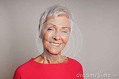 Happy mature woman in her sixties Stock Photo