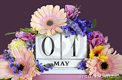 Happy May Day calendar with flowers. Stock Photo