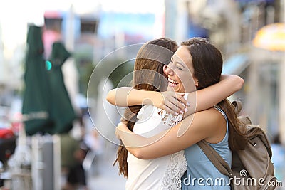 Happy meeting of friends hugging Stock Photo
