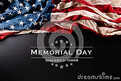 Happy Memorial Day. American flags with the text REMEMBER & HONOR against a black background. May 25 Stock Photo