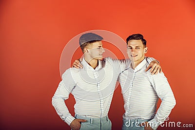 Happy men hugging Stock Photo