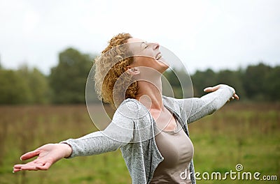 Happy middle aged woman enjoying life Stock Photo