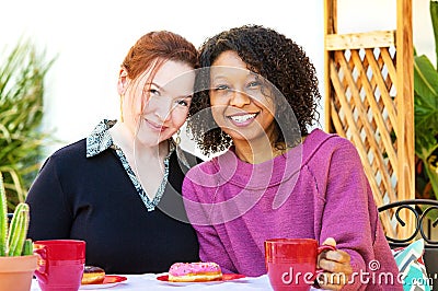 Happy mixed lesbian couple Stock Photo