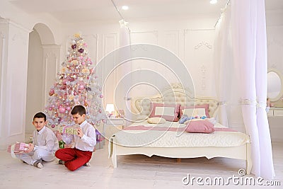 Happy morning after new year and opening of holiday gifts by chi Stock Photo