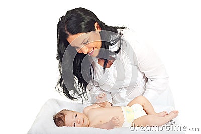 Happy mother caring newborn baby Stock Photo