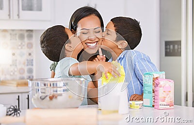 Happy, mother and children kissing cheek for love, baking and mothers day celebration in the kitchen at home. Mama smile Stock Photo