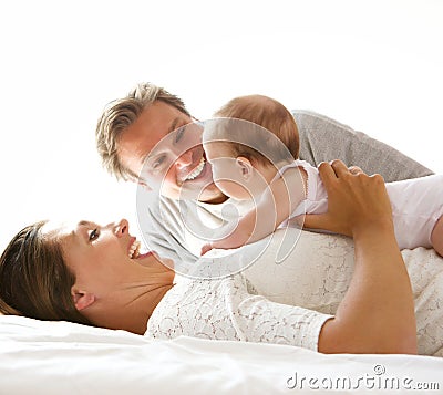 Happy mother and father with newborn child Stock Photo