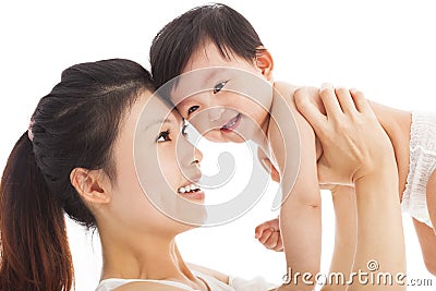 Happy mother holding adorable child baby boy Stock Photo