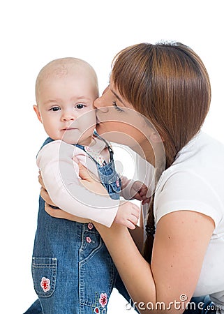 Happy Mother kissing her baby Stock Photo