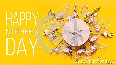 Happy Mother`s Day Background. Bright Yellow and Pastel Pink Colored Mother Day Background. Flat lay greeting card. Stock Photo